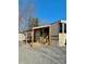 Retreat RV's covered patio and entry steps at 106 Hummingbird Cir, New London, NC 27281