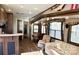 Open floor plan with kitchen, dining, and living areas at 106 Hummingbird Cir, New London, NC 27281