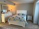 Bright bedroom with a large window and white dresser at 11121 S Harrowfield Rd, Charlotte, NC 28226