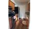 Functional kitchen with wood cabinets, granite countertops, and stainless steel appliances at 11121 S Harrowfield Rd, Charlotte, NC 28226
