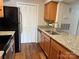 Well-lit kitchen showcasing granite countertops and stainless steel appliances at 11121 S Harrowfield Rd, Charlotte, NC 28226