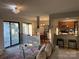 Inviting living room with an open layout flowing into the dining area and a breakfast bar at 11121 S Harrowfield Rd, Charlotte, NC 28226