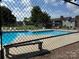 Community pool featuring clear blue water with plenty of lounge seating and nearby apartments at 11121 S Harrowfield Rd, Charlotte, NC 28226