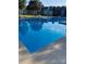 Community pool with bright blue water at 11121 S Harrowfield Rd, Charlotte, NC 28226