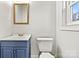 Bathroom featuring a modern vanity, a toilet, and a mirror at 1160 Nw 11Th Street Cir, Hickory, NC 28601