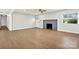 Inviting living room featuring hardwood floors, a fireplace, and neutral paint, ready for personal touches at 1160 Nw 11Th Street Cir, Hickory, NC 28601