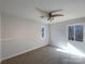 Spacious bedroom with neutral walls and ceiling fan at 122 Cricket Creek Dr, Cherryville, NC 28021
