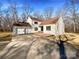 Two-story house with attached two-car garage and deck at 122 Cricket Creek Dr, Cherryville, NC 28021