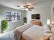 Main bedroom with large window and staged furniture at 122 Cricket Creek Dr, Cherryville, NC 28021