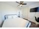 Bedroom with a queen bed, dark wood floors and ceiling fan at 1233 Rollingwood Dr, Charlotte, NC 28217