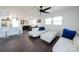 Open concept kitchen and living area with hardwood floors and modern appliances at 1233 Rollingwood Dr, Charlotte, NC 28217