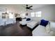 Bright living room with sectional sofa and ceiling fan at 1233 Rollingwood Dr, Charlotte, NC 28217