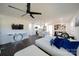 Open living room with white sectional sofa and dark hardwood floors at 1233 Rollingwood Dr, Charlotte, NC 28217