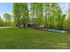 Large backyard with inground pool and view of house at 176 Butch Branch Rd, Union Grove, NC 28689