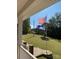 View from the porch of a spacious backyard with US and NC flags at 176 Butch Branch Rd, Union Grove, NC 28689
