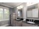 Bathroom with double vanity and black granite countertop at 176 Butch Branch Rd, Union Grove, NC 28689