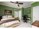 Green bedroom with a queen bed and workspace at 176 Butch Branch Rd, Union Grove, NC 28689
