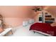 Bedroom with a bed, built-in shelving, and ceiling fan at 176 Butch Branch Rd, Union Grove, NC 28689