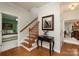 Bright entryway with hardwood floors and staircase at 176 Butch Branch Rd, Union Grove, NC 28689