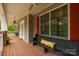 Front porch with seating area and a view of the backyard at 176 Butch Branch Rd, Union Grove, NC 28689