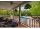 Relaxing view of a backyard pool from a covered porch at 176 Butch Branch Rd, Union Grove, NC 28689