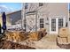 Private backyard with patio furniture and grill at 19510 Deer Valley Dr, Cornelius, NC 28031