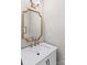 Vanity with a modern white sink and gold accents at 19510 Deer Valley Dr, Cornelius, NC 28031