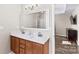 Double vanity bathroom with modern fixtures and a large mirror at 19510 Deer Valley Dr, Cornelius, NC 28031