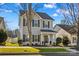 Two-story house with gray siding, black shutters, and a front porch at 19510 Deer Valley Dr, Cornelius, NC 28031