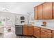 Modern kitchen features stainless steel appliances and light wood cabinets at 19510 Deer Valley Dr, Cornelius, NC 28031