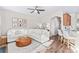 Bright living room features L-shaped sofa, wood floors, and an open floorplan to the kitchen at 19510 Deer Valley Dr, Cornelius, NC 28031