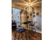 Small breakfast nook with round table and three blue chairs at 201 Hoskins Rd # 115, Charlotte, NC 28208