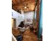 Spacious living room with exposed brick, high ceilings, and hardwood floors at 201 Hoskins Rd # 115, Charlotte, NC 28208