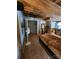Main bedroom with walk-in closet and exposed wood beams at 201 Hoskins Rd # 115, Charlotte, NC 28208