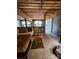 Spacious main bedroom with exposed wood beams and large windows at 201 Hoskins Rd # 115, Charlotte, NC 28208