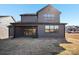 Backyard with a screened-in porch, dark siding, and newly laid sod in a modern style home at 224 Windy Dell Dr, Tega Cay, SC 29708