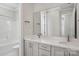 Modern bathroom featuring double sinks with white countertops and cabinets, plus a shower/tub combination at 224 Windy Dell Dr, Tega Cay, SC 29708