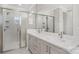 Bathroom featuring a shower and dual sink vanity at 224 Windy Dell Dr, Tega Cay, SC 29708