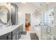 Beautiful bathroom featuring double sinks, shower, tub and view into the main bedroom at 311 Kaitlyn Ln, Kings Mountain, NC 28086