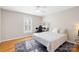 Cozy bedroom with a neutral palette, a ceiling fan, and hardwood floors at 311 Kaitlyn Ln, Kings Mountain, NC 28086