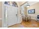 Bright foyer with arched doorway, wood floors, and adjacent dining area at 311 Kaitlyn Ln, Kings Mountain, NC 28086