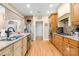 Well-equipped kitchen featuring granite counters, stainless steel appliances, and hardwood floors at 311 Kaitlyn Ln, Kings Mountain, NC 28086