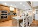 Spacious kitchen with granite countertops, stainless appliances, and center island with bar seating at 311 Kaitlyn Ln, Kings Mountain, NC 28086