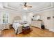 Serene primary bedroom with trey ceilings, hardwood floors, and plenty of natural light at 311 Kaitlyn Ln, Kings Mountain, NC 28086
