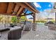 Outdoor entertaining space with a seating and grill area near in-ground pool at 311 Kaitlyn Ln, Kings Mountain, NC 28086
