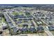 Community view showcasing homes, landscaping, and pool at 3809 Carl Parmer Dr, Harrisburg, NC 28075