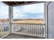 Balcony overlooking parking lot and distant shops at 3809 Carl Parmer Dr, Harrisburg, NC 28075
