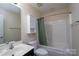 Clean bathroom with tub shower, vanity, and toilet at 3809 Carl Parmer Dr, Harrisburg, NC 28075