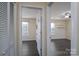 Two bedrooms with dark floors and neutral walls at 3809 Carl Parmer Dr, Harrisburg, NC 28075