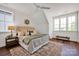 Bright and airy main bedroom with hardwood floors, modern furniture, and lots of natural light at 421 Delburg Mill Alley Dr, Davidson, NC 28036